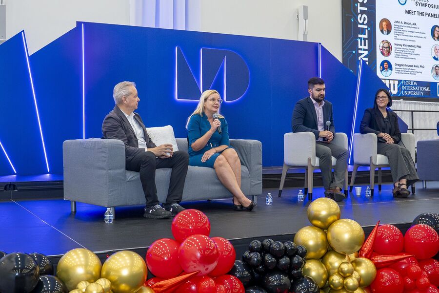 Dr. Nancy Richmond speaking on a panel at an FIU symposium